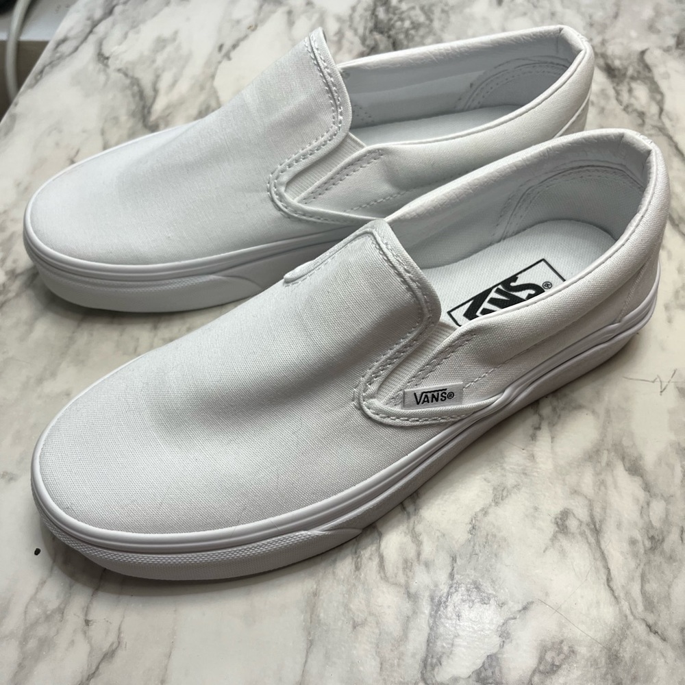Vans White Slip Ons